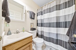 Combined shower/tub, hair dryer, towels, soap