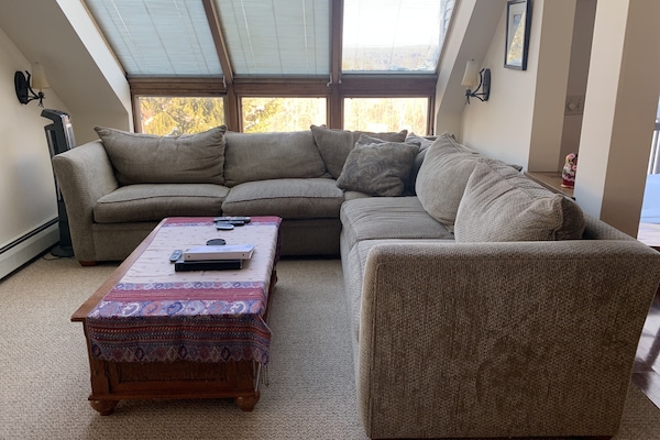 living room with plenty of seating