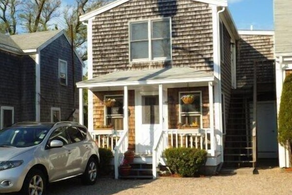 Street view of condo front and the one car parking space.