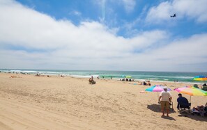 On the beach, sun loungers, beach towels