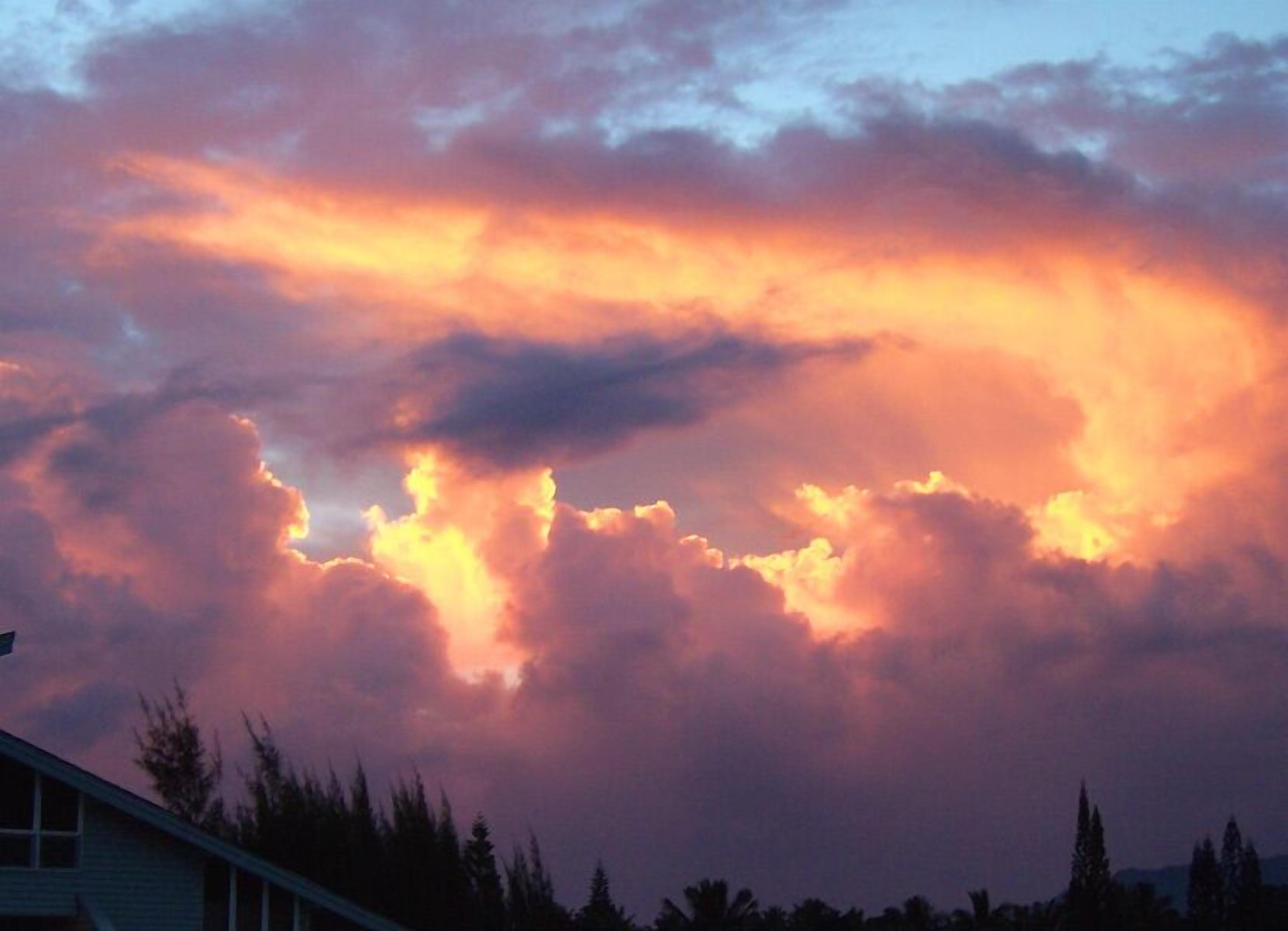 Flaming Tropical Sunrise and Sunset Views--this one from our Lanai