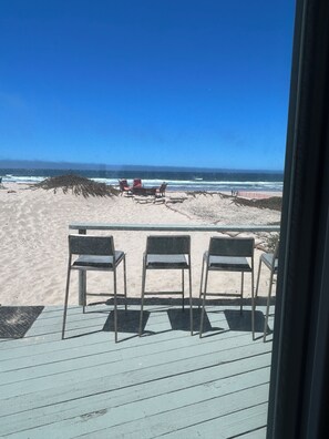 On the beach, sun loungers