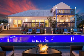 A heated pool, pool loungers