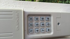 A white plastic object with a keypad and the brand name "GLICKER" visible on the side. -  Savannah Suite  (Kennesaw)
