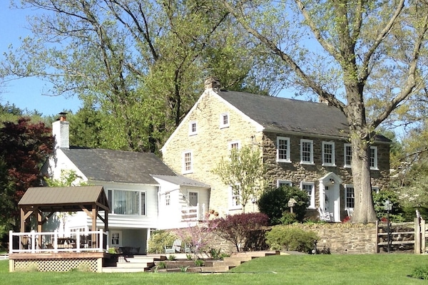 Stunning 3500 sq. ft. stone home with POOL on immaculate 50 acre horse farm