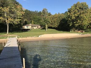 Spacious and private sand beach - property is quiet, surrounded by trees