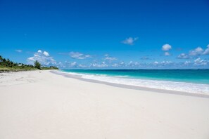 Beach nearby, beach umbrellas - Restored Historic Beach Villa with Pool and Spectacular Views (Governors Harbour)