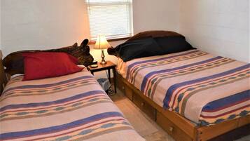 2 habitaciones y ropa de cama