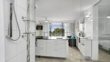 Shower, hair dryer, towels, soap