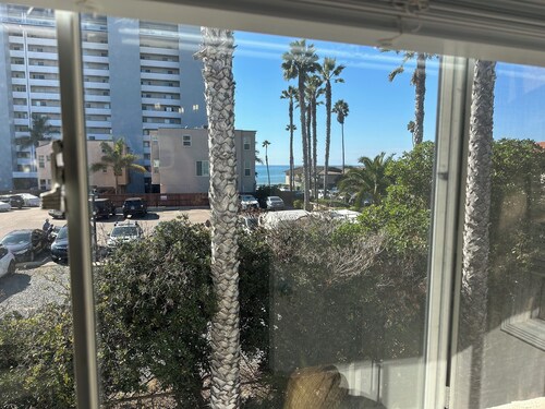 Newly refreshed  Beach Apartment..Steps to the sand!