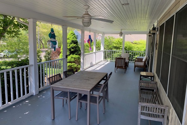 Front porch eating area overlooking lawn