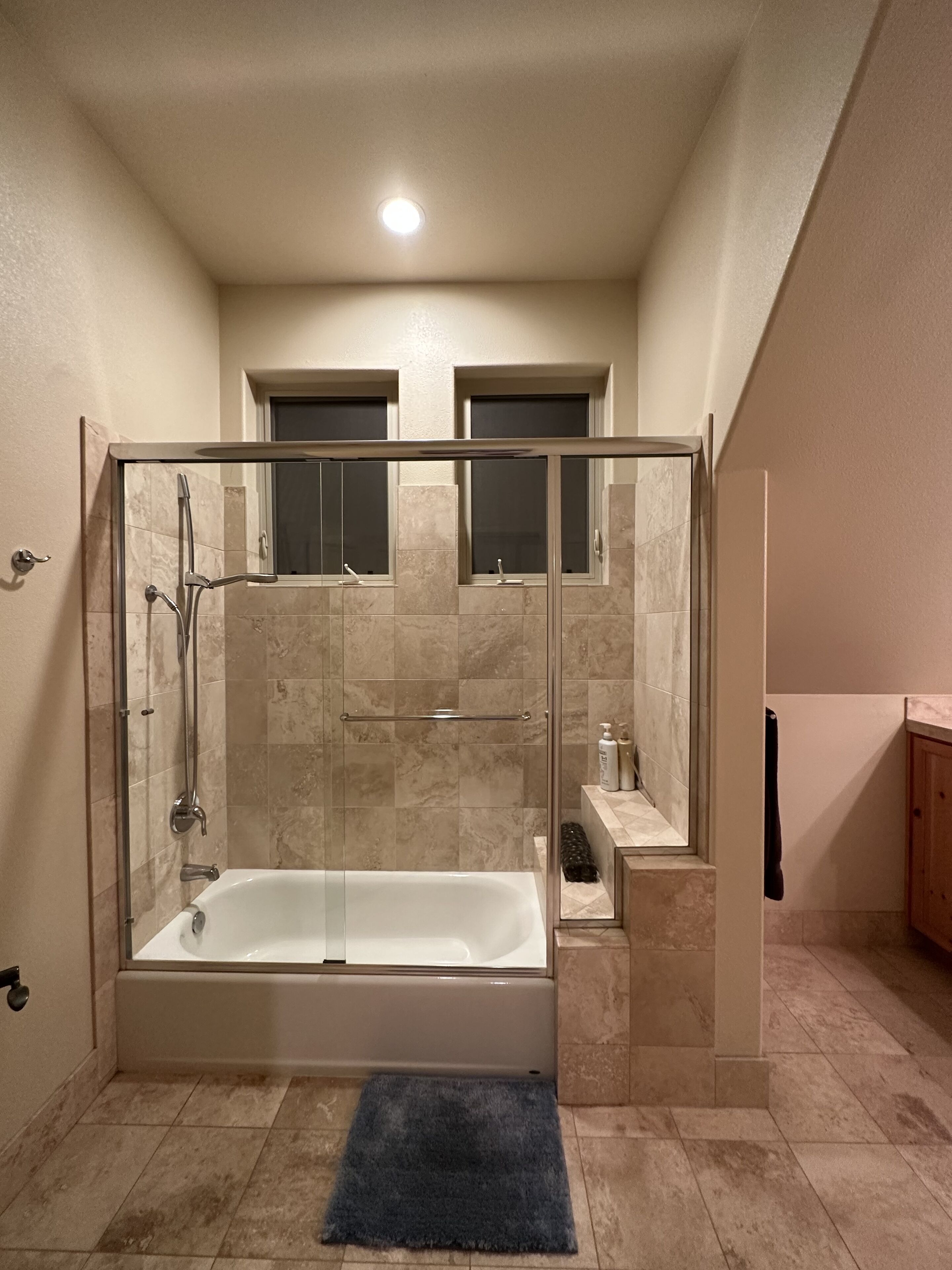 Combined shower/tub, towels, soap, shampoo