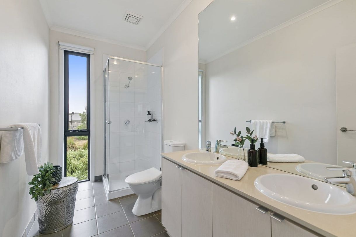 Bathtub, hair dryer, towels, soap
