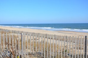A beach with a wooden fence and sand dunes. - 4 Blocks to Beach, 4BR, 3.5BA, Great for Families Pets OPEN For rental 2026 2027 (Bethany Beach)