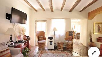 Smart TV, fireplace, DVD player, books