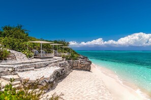 On the beach, sun-loungers, beach towels