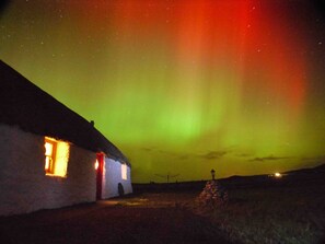 Exterior - Welcome to our romantic, traditional thatched blackhouse; an ideal retreat (Lochmaddy)