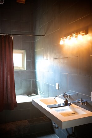 Bathtub, jetted tub, hair dryer, towels