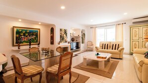 TV, DVD player, books, stereo - Encosta do Lago, two suits Finest Apartment with Private Pool and garden. (Almancil)