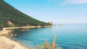 A coastal landscape with a clear sky, a sandy beach, and calm waters. - House / Villa - VILLANOVA (Villanova)