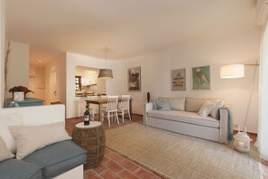 TV, fireplace, books