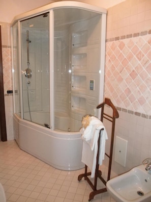 Combined shower/tub, jetted tub, hair dryer, bidet