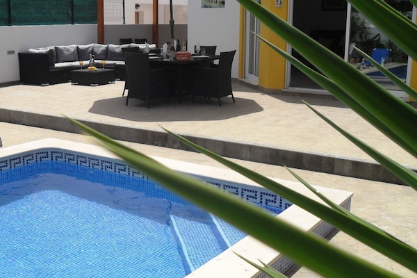Comfortable Outdoor Sofa & Dining Furniture overlooking the Pool