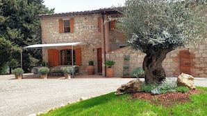 A stone building with a sign reading "S. Girolamo."