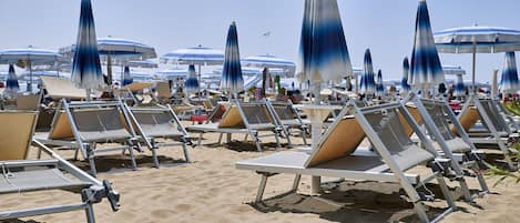 Beach nearby, sun loungers