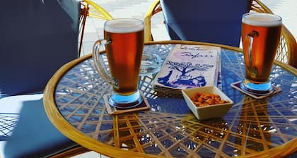 Nauti auringosta, hiekasta ja suolaisesta merestä tyylikäs lattia ensimmäisellä rivillä