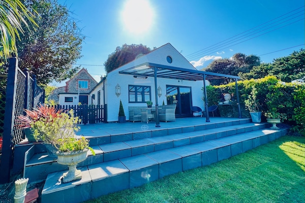 2022 – New veranda and terrace steps down to large lawned garden