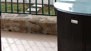 A pool area with a sign indicating its location, surrounded by a fence and greenery. - Holiday Home with Large Private Pool And Hill Views In The Heart Of The Dordogne (Condat-Sur-Vézère)