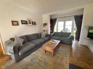 Smart TV, fireplace, books, video library