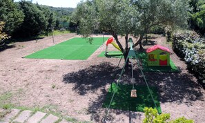 Children’s area - Villa Donzell, 14m private pool and Jacuzzi, Large Garden, Kids Play Area (alghero)