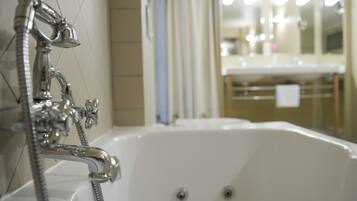 Jetted tub, hair dryer, towels, soap