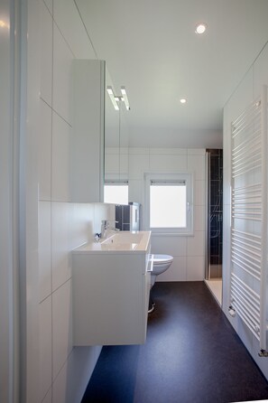 Een douche, toiletpapier