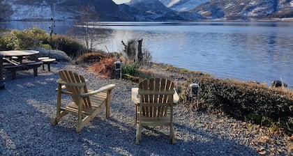 A loch side property with stunning views located in a walker's .
