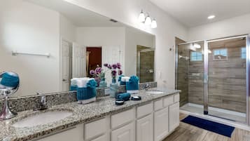 Combined shower/tub, hair dryer, towels, soap