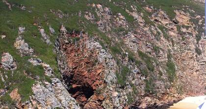 Luxury modern villa with private swimming pool and unique view of ocean and mountain landscape