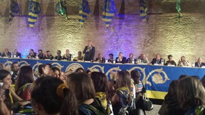 A conference room with a long table, people seated, and a speaker at the front. - Period residence located in the heart of Siena (Siena)