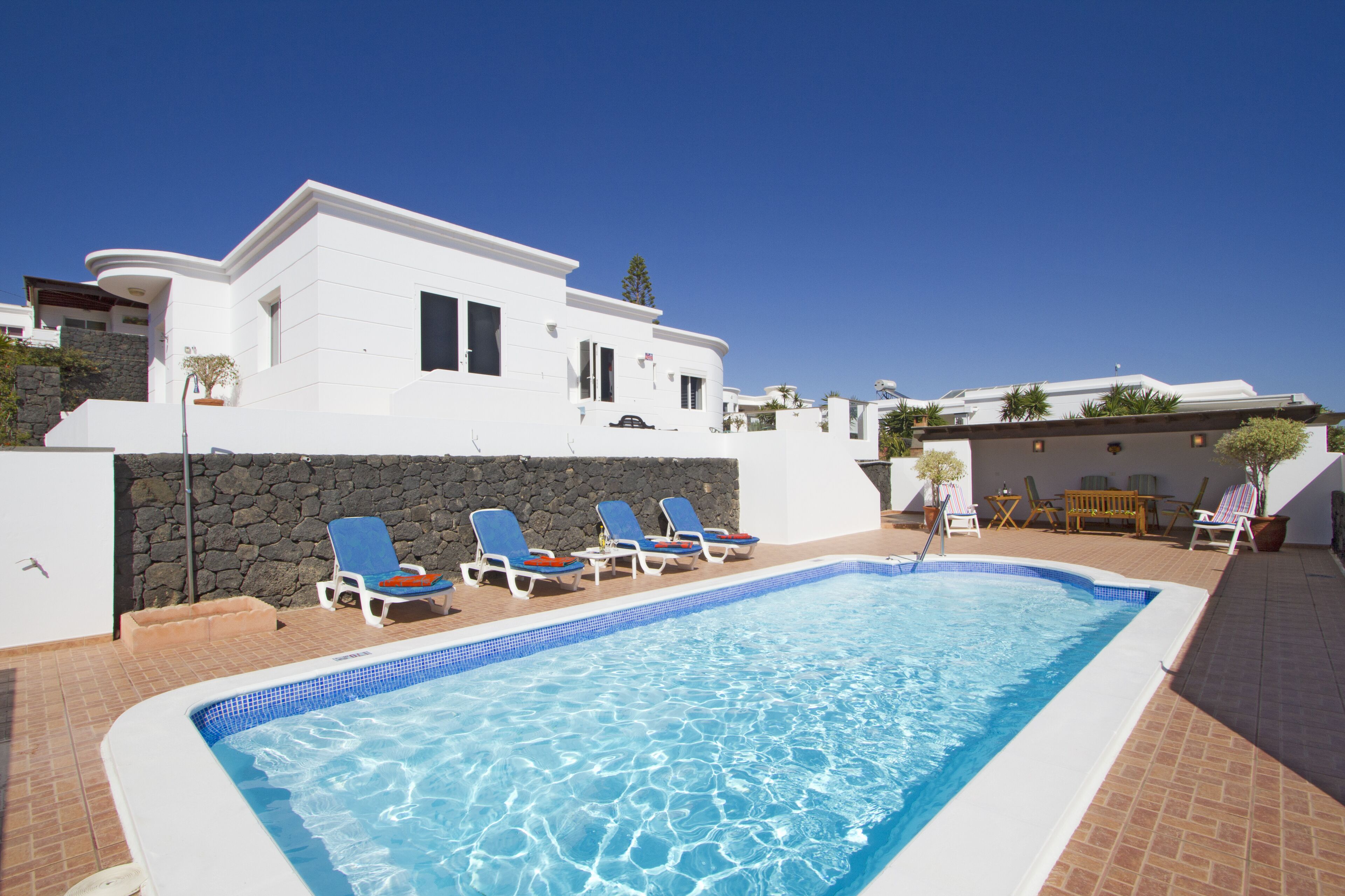 Outdoor pool, a heated pool, sun loungers