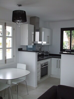 Fridge, oven, stovetop, dishwasher - One-bed top floor boutique apartment. Stunning views out over the Mediterranean. (Nerja)