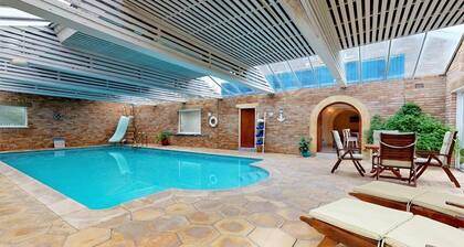 Apartment with private, indoor, heated pool, sauna + snooker room in Swanage.