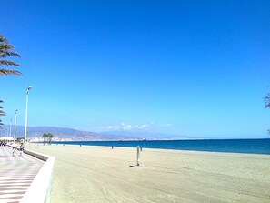 On the beach, beach towels