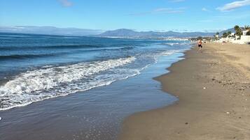 Beach nearby, sun loungers, beach towels
