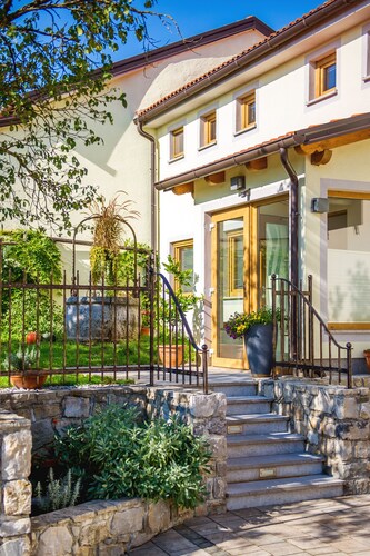 ZENJA - a solar house with a step to the caves of San canziano