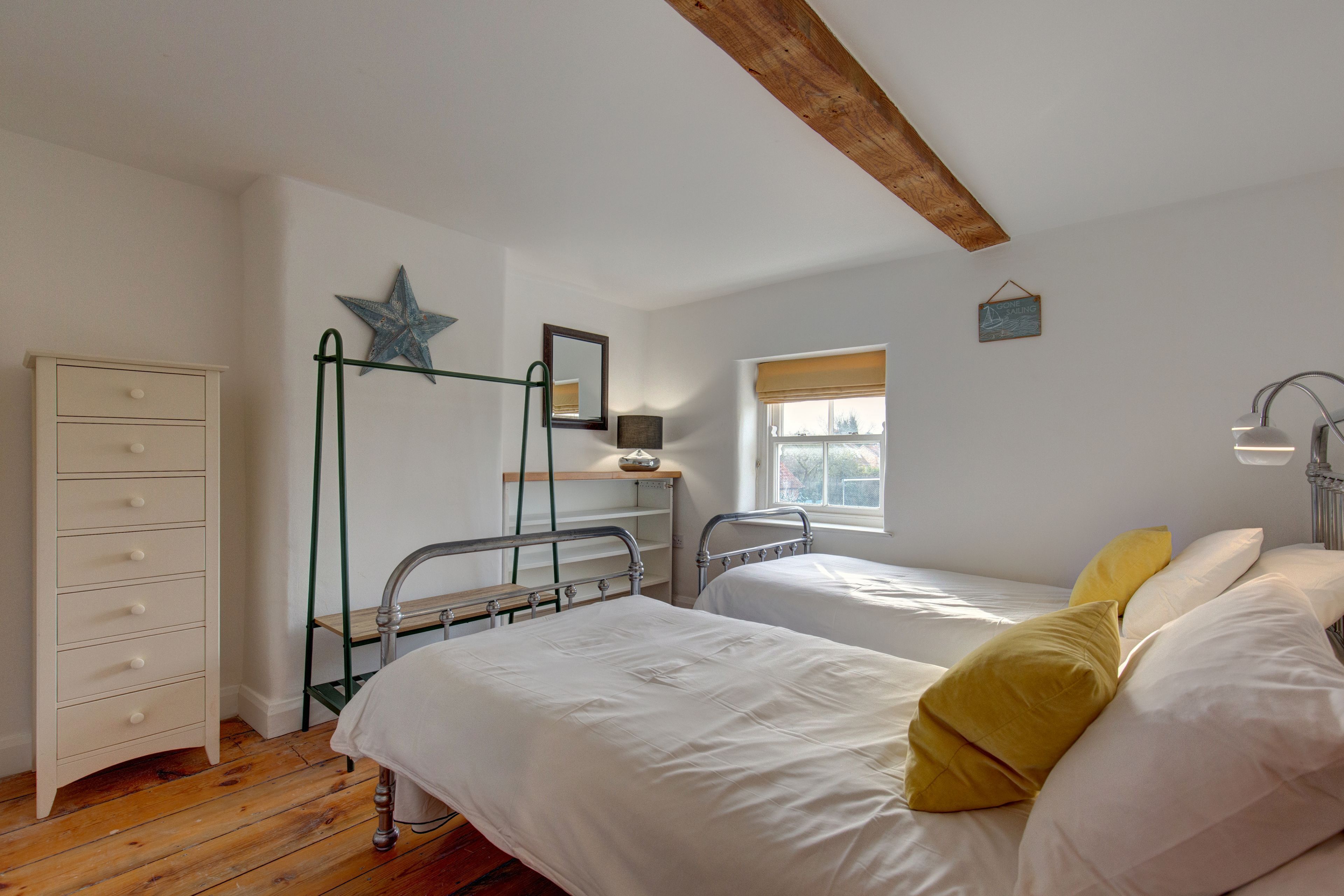 First floor: Bedroom two with 3' twin beds