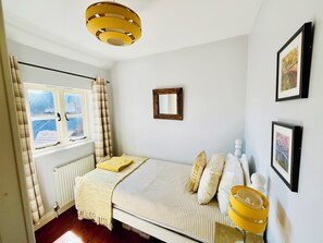 2 bedrooms, desk, iron/ironing board, travel crib