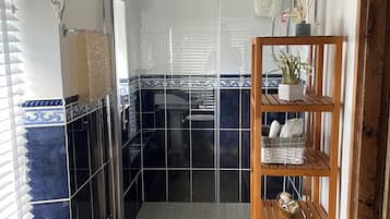 Bathtub, bidet, towels, soap