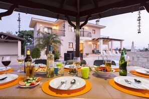 Outdoor dining - Villa Leni - Luxurious 4 Bed, 3 Bath Villa with Private Heated Pool*, Hot Tub* & Stunning Views (Argaka)
